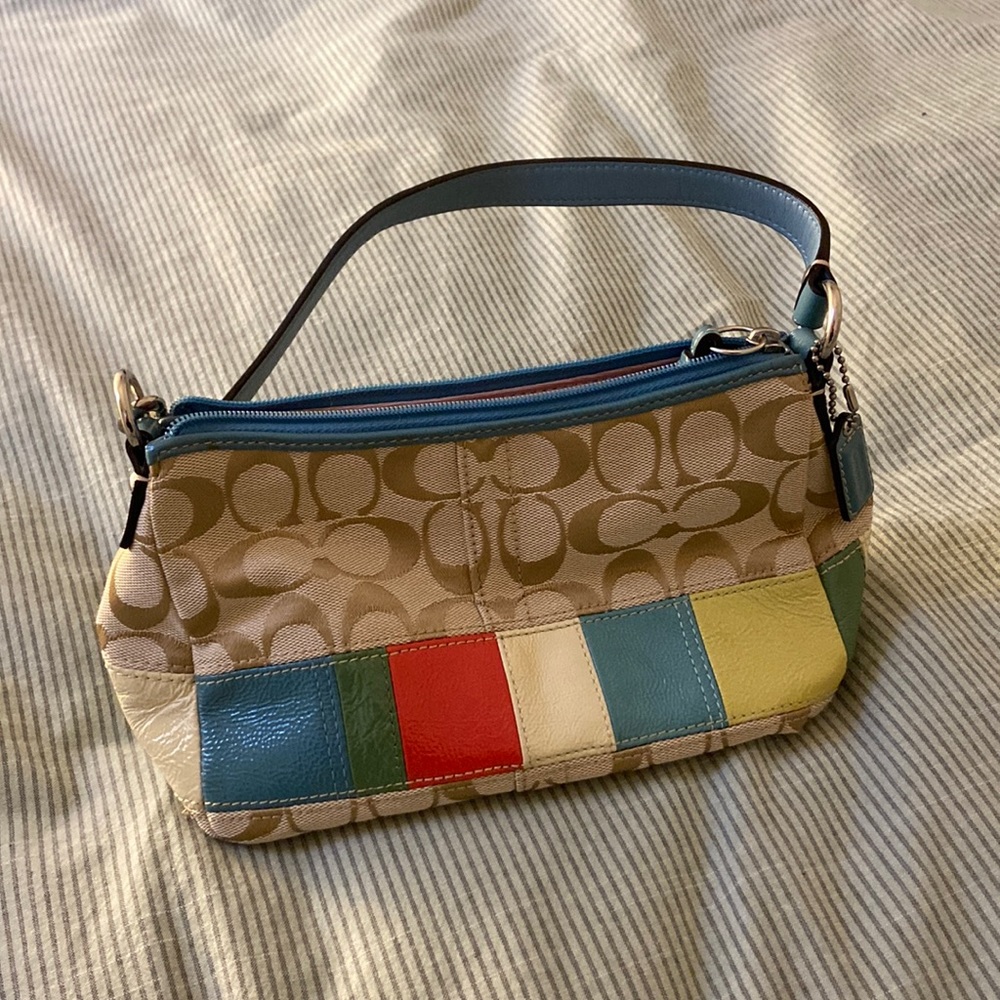 Mini Coach shoulder purse with colorblock detailing.
